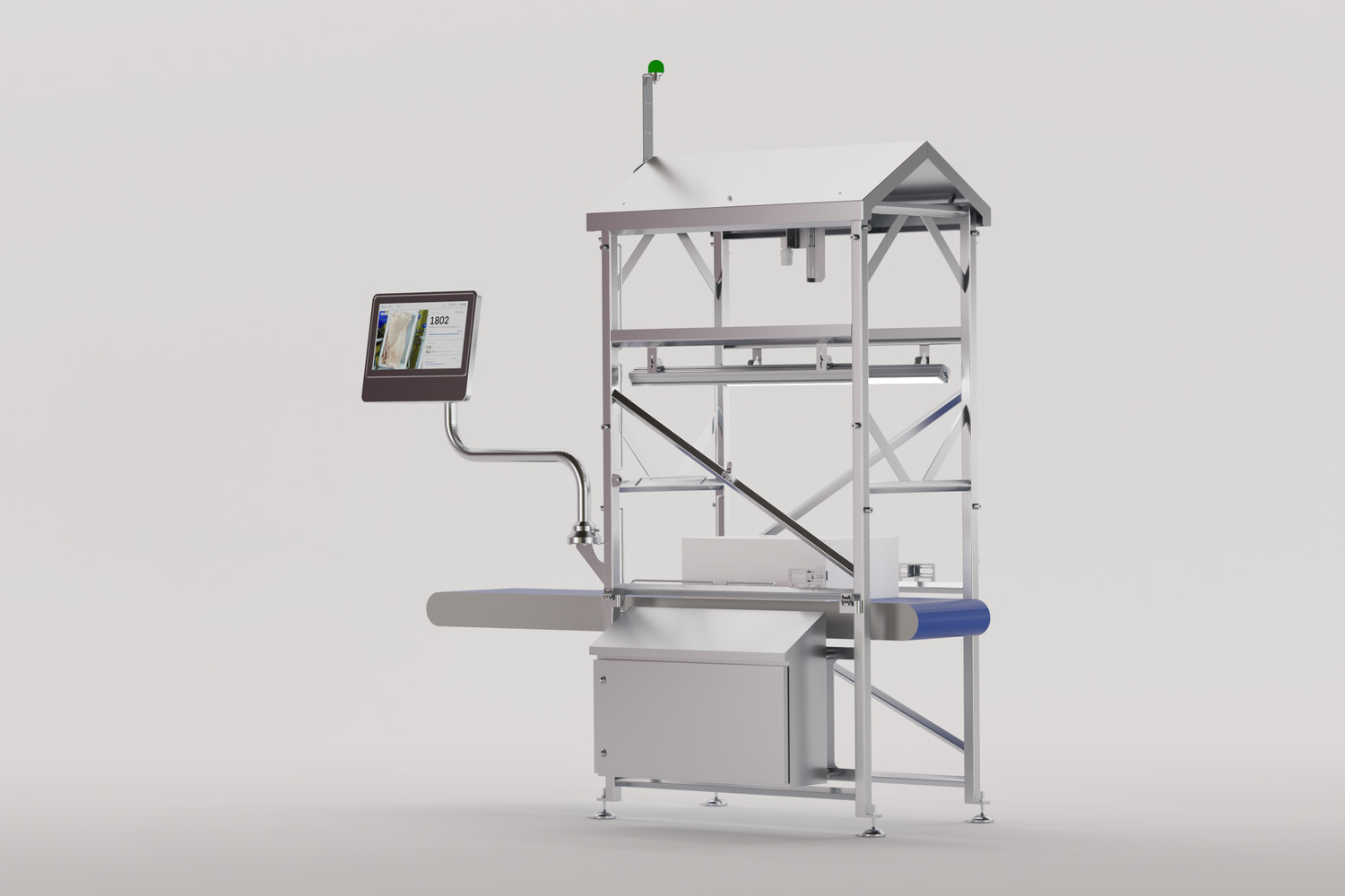The MeatVision station: stainless enclosure with closed hood, mounted over the conveyor